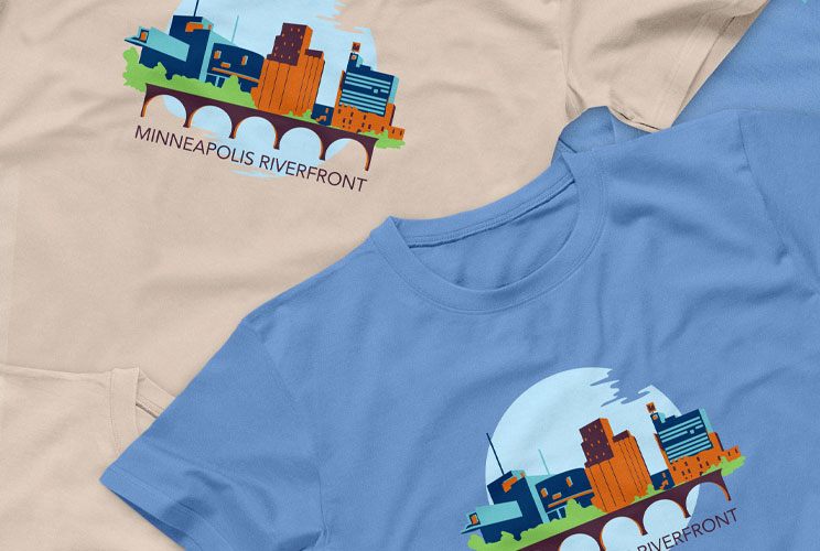 T shirts with an illustration of a skyline with the words minneapolis riverfront