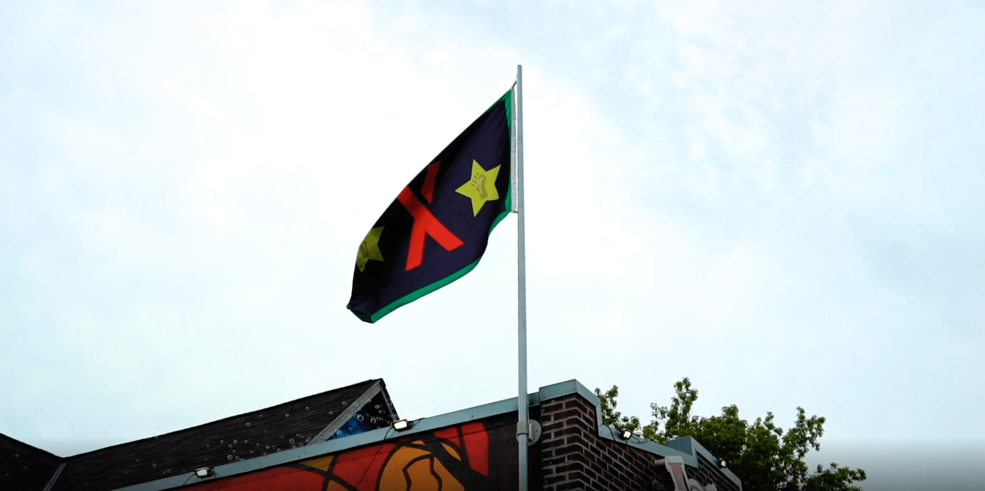 A overhead shot of the JXTA Flag on JXTA's campus